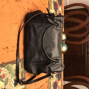Large black leather handbag.
